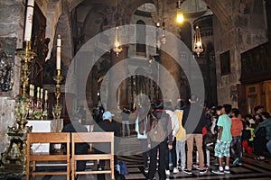 Pilgrims in front of The  Edicule in The Church of the Holy Sepulchre, Christ`s tomb, in the Old City of Jerusalem, Israel